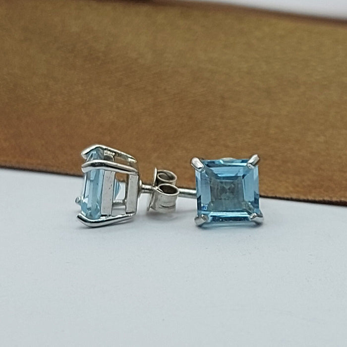 Ladies Sterling Silver Earrings (925) Square Cut Blue Created Aquamarine Studs