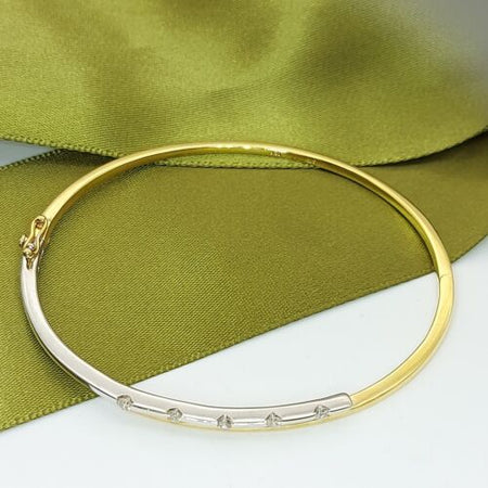 Ladies Bangle 9ct (375, 9K) Two Tone Gold Diamond (25pts) Oval Bangle