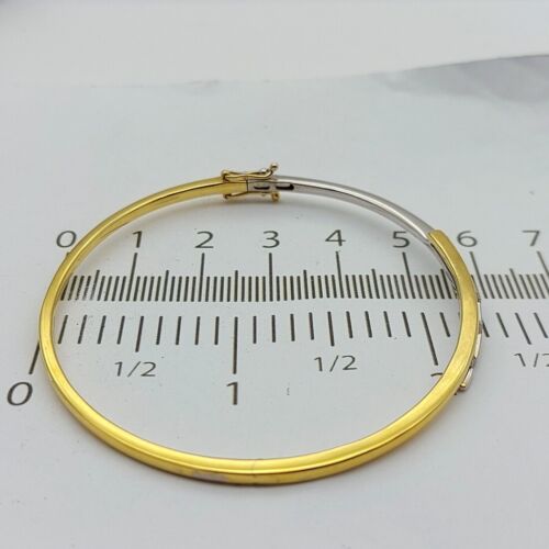 Ladies Bangle 9ct (375, 9K) Two Tone Gold Diamond (25pts) Oval Bangle