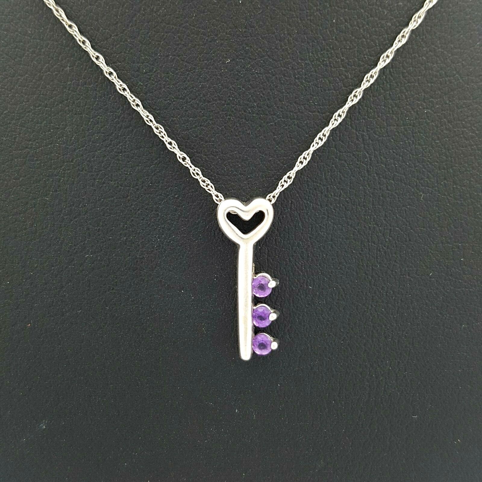 Ladies 10ct (417, 10K) White Gold Fine Twisted Chain with Amethyst Key Pendant