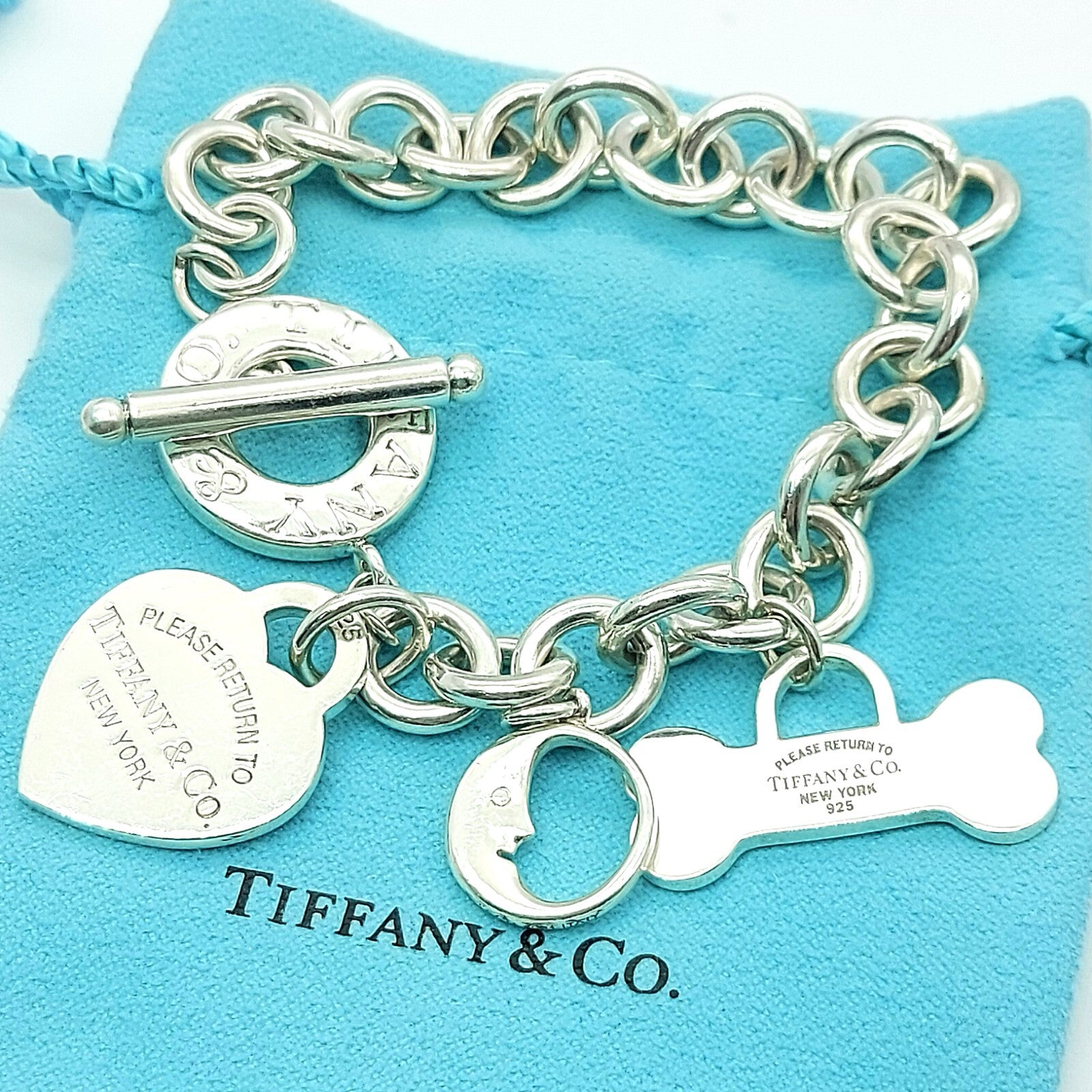 Ladies Tiffany & Co. 925 Sterling Silver Heart Tag/ Bone/ Moon Charms Bracelet