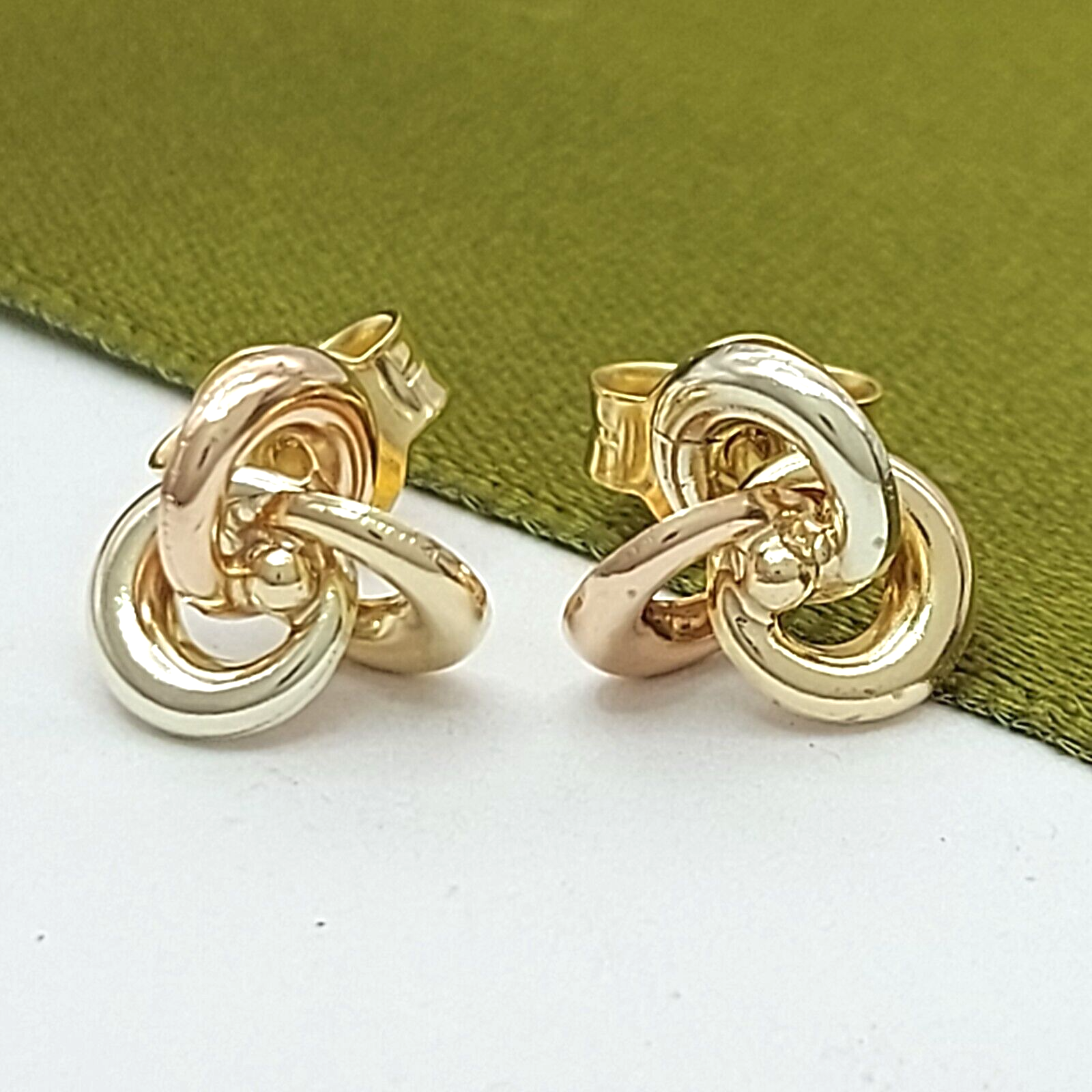 Ladies Earrings 10ct (417, 10K) MHJ Three-Tone Gold Swirl/Knot Stud Earrings