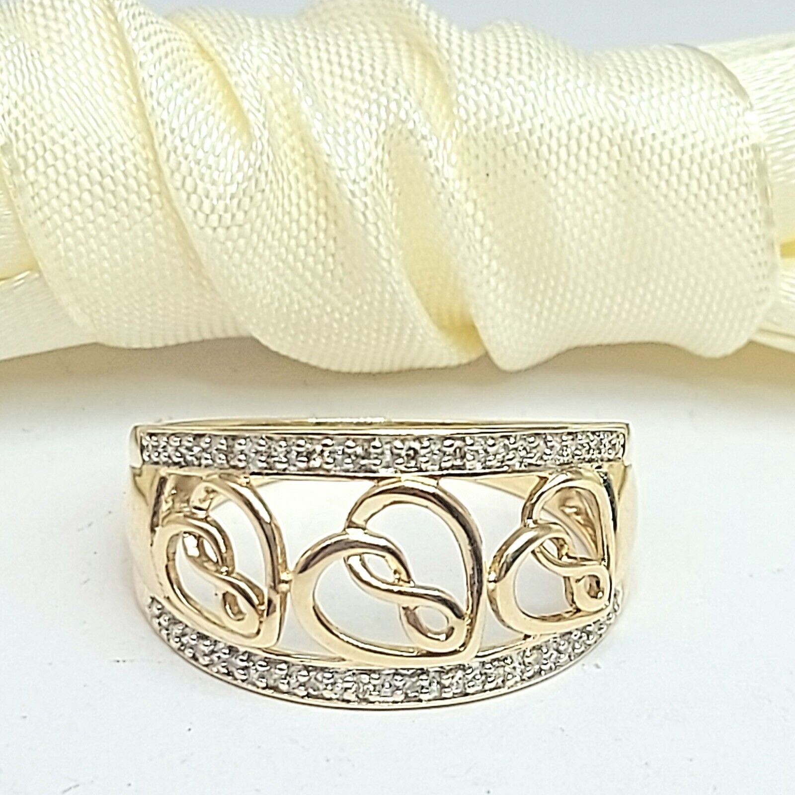 Ladies Yellow Gold 10ct (417,10K) MHJ Infinity Heart ring with Diamonds (15pts)